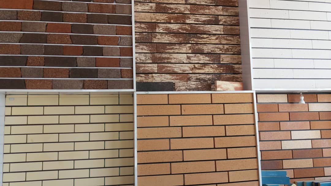 Sound transmission coefficient in stone facade and brick facade